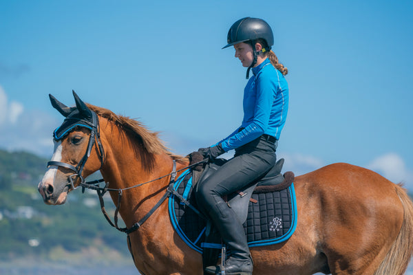 Black/Turquoise Saddle Pads - Jump, GP, and Dressage cuts