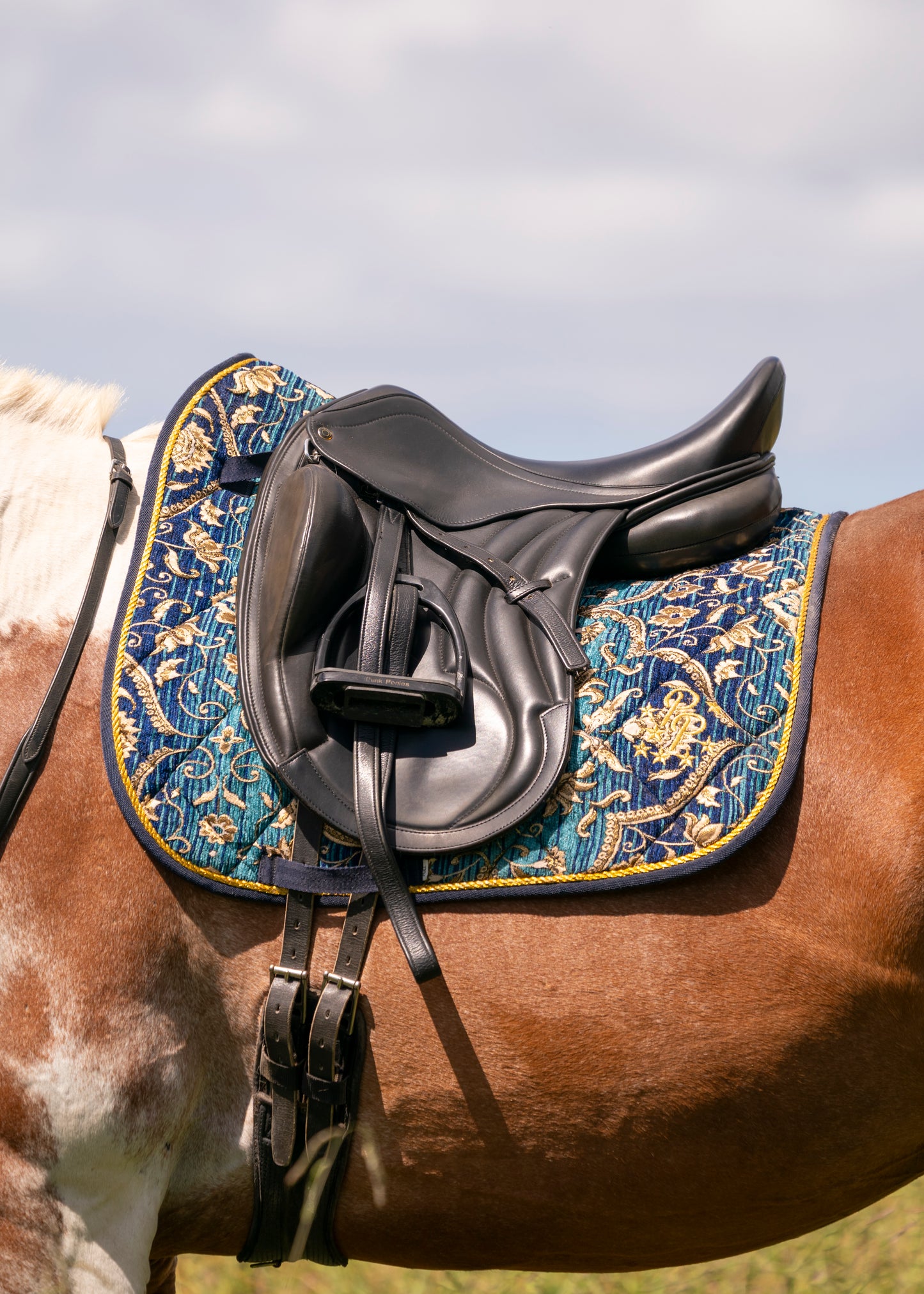 Turquoise Jacquard Saddle Pads - Jump and Dressage Cuts