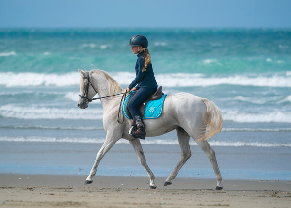 Turquoise Saddle Pads - Jump, GP, and Dressage cuts
