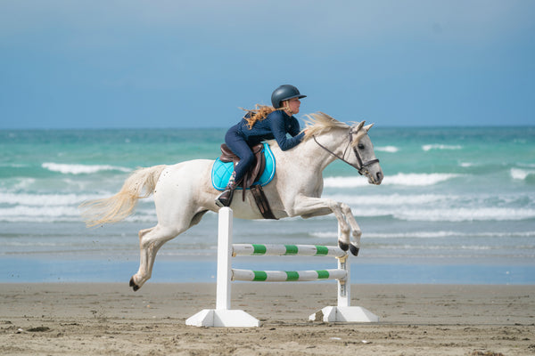 Turquoise Saddle Pads - Jump, GP, and Dressage cuts