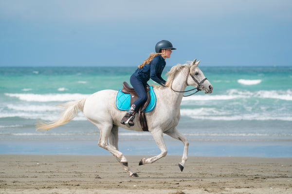 Turquoise Saddle Pads - Jump, GP, and Dressage cuts