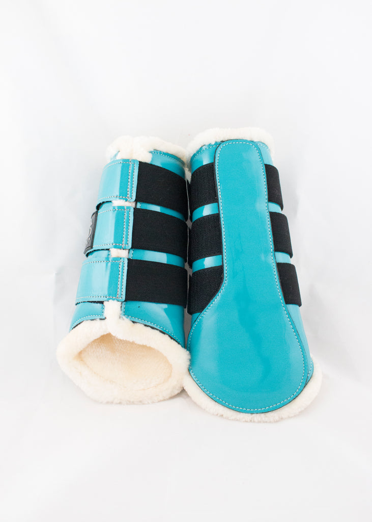 Teal brushing boots sales